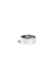 A silver hammered cigar band against a white background.