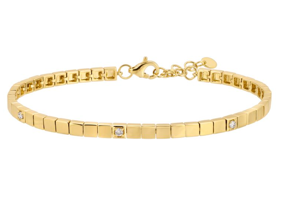 Solid 14k gold station link bracelet with 5 vs1 diamonds evenly positioned throughout. A lobster clasp with a 1 inch extender chain on the 6 inch bracelet. Set against a white background