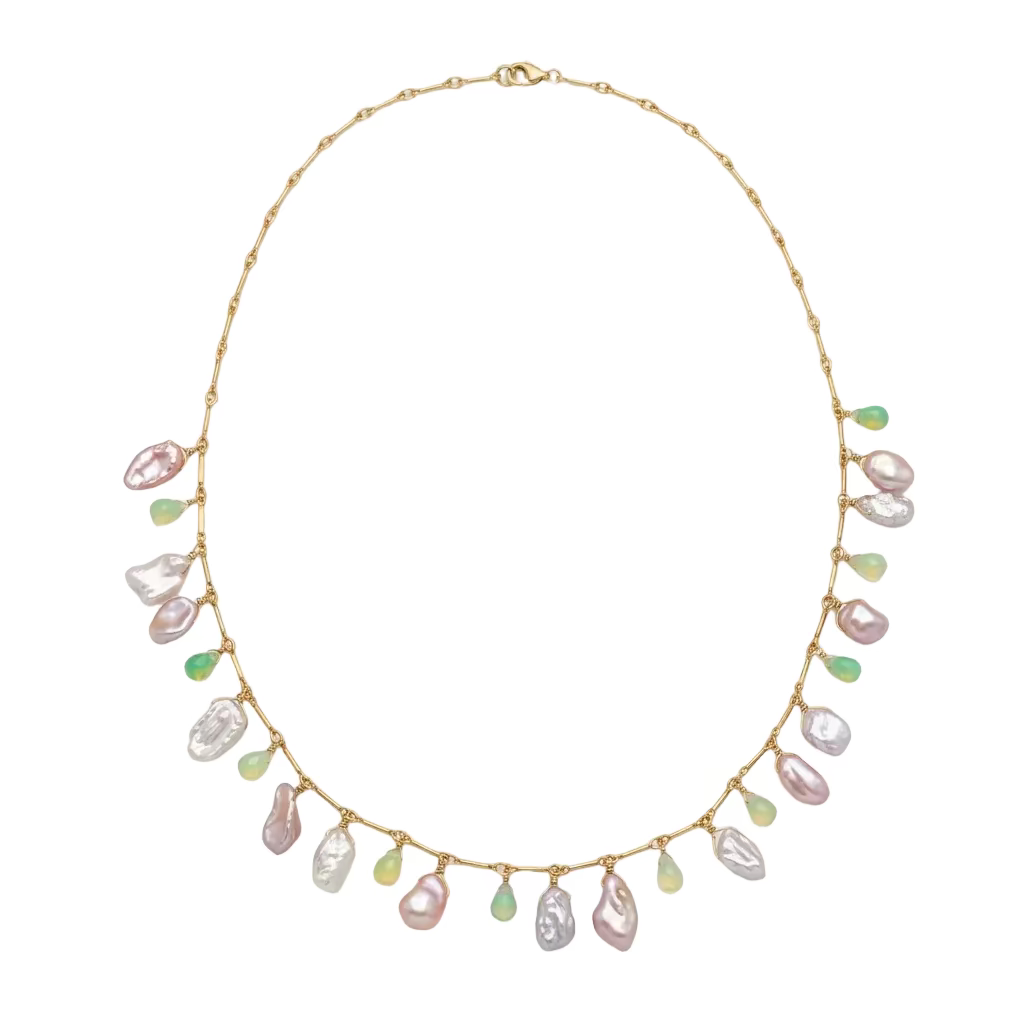 Freeform baroque pearls in blush pink and luminous white drift along a fine gold chain. Between them, tiny briolette opals flicker with seafoam green and honeyed yellow. The solid 14k yellow gold chain is delicately textured, its slender links adding a subtle shimmer of their own. Against a white background.