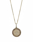 A 14k solid gold pendant on a 24" box chain, showcasing a St. Christopher coin design.