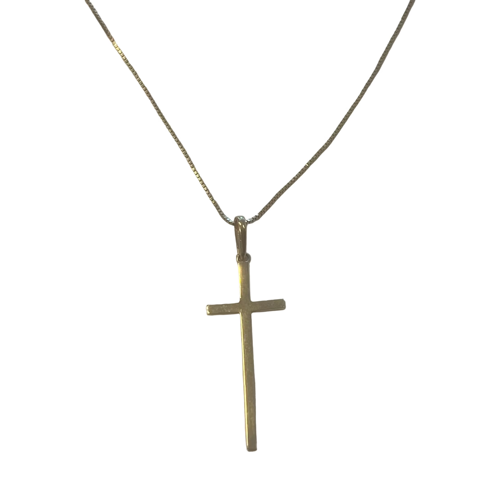 A 14k gold cross pendant necklace on a delicate gold box chain, displayed on plain white background.