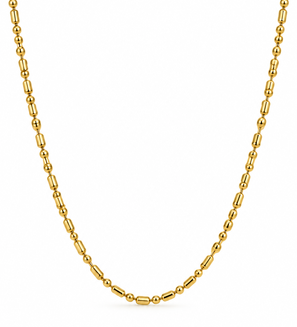 Gold vermeil chain necklace, that alternates between bar and ball beads on a white background