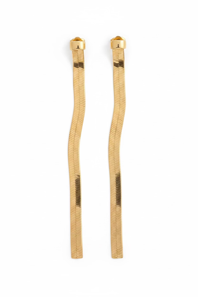 A pair of gold vermeil herringbone chain style dangle earrings with a white background.