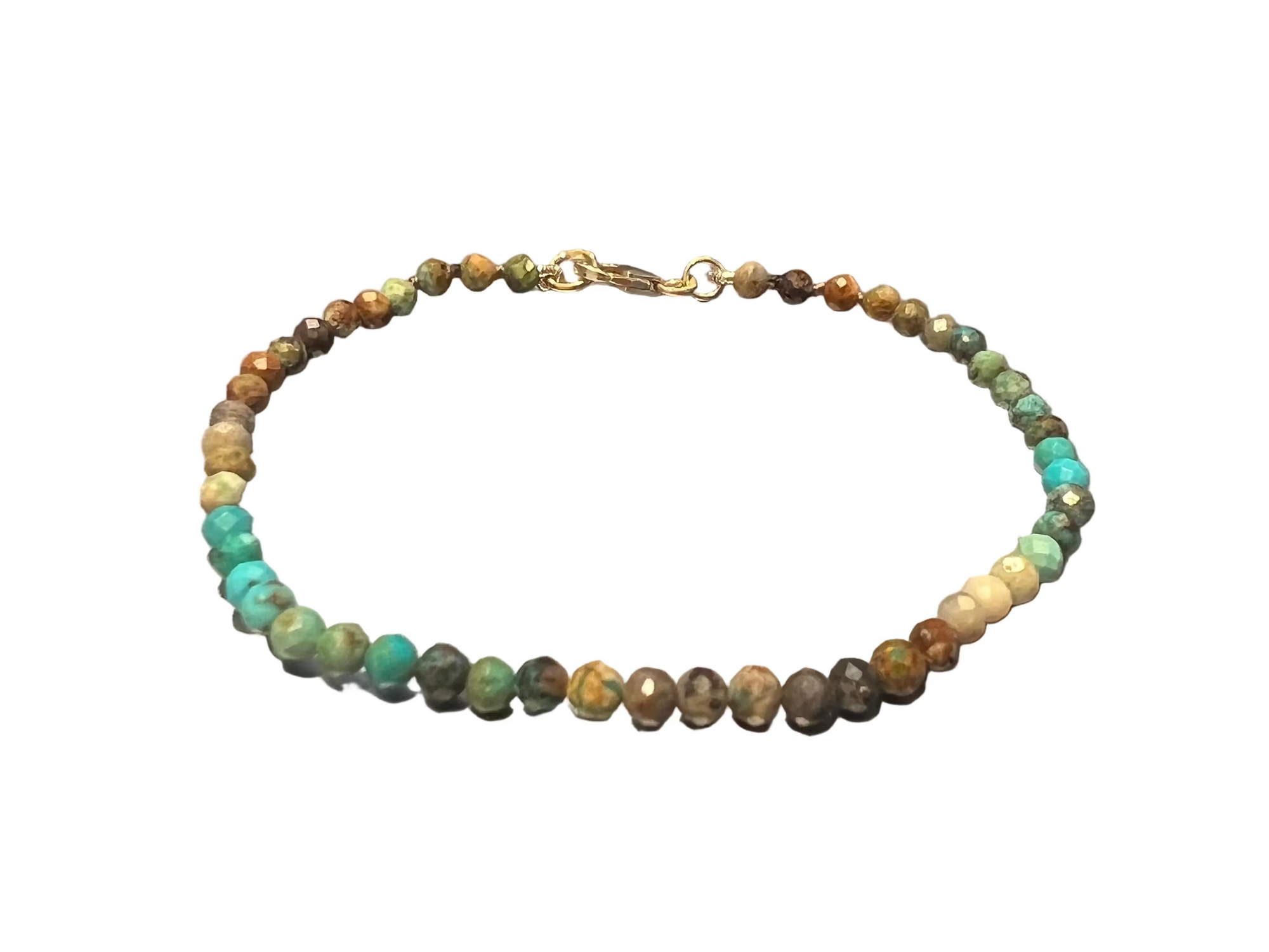 A beaded bracelet with multicolored round turquoise stones in shades of green and brown featuring a small gold-filled clasp, displayed on a white background.
