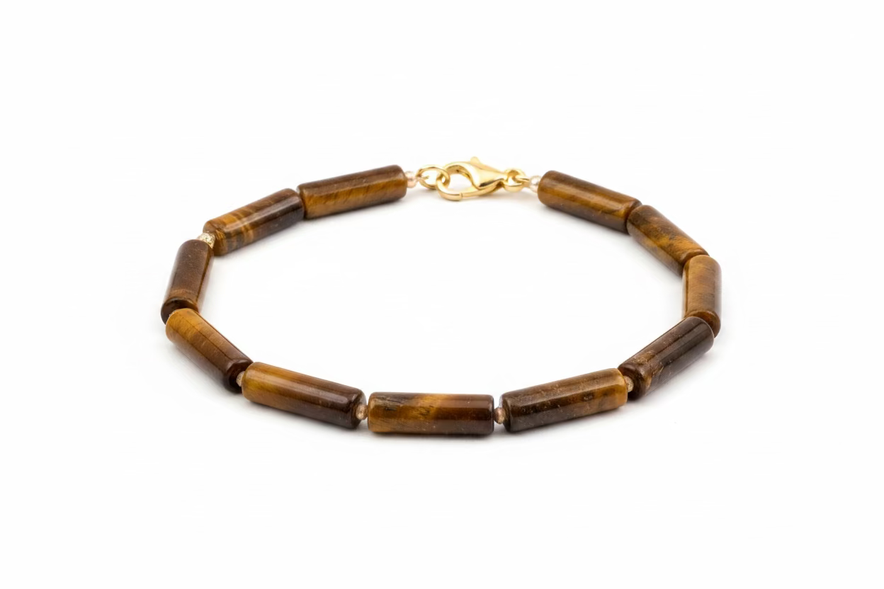 Brown Tiger's Eye bar beaded bracelet with a white background. 